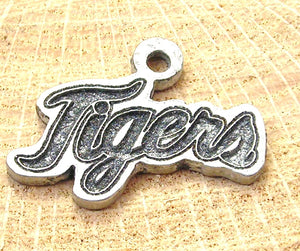 Tigers in cursive Charm